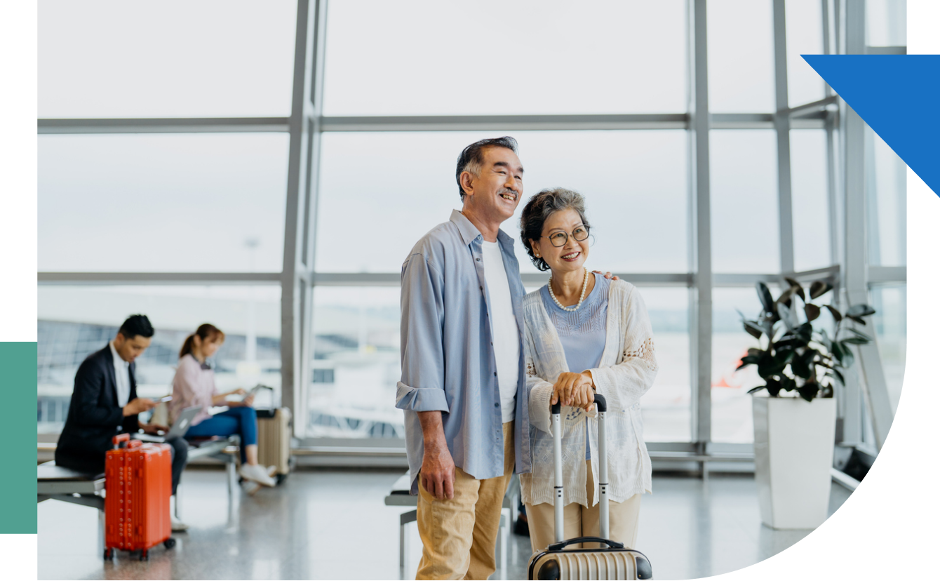 Older couple with suitcases at an airport