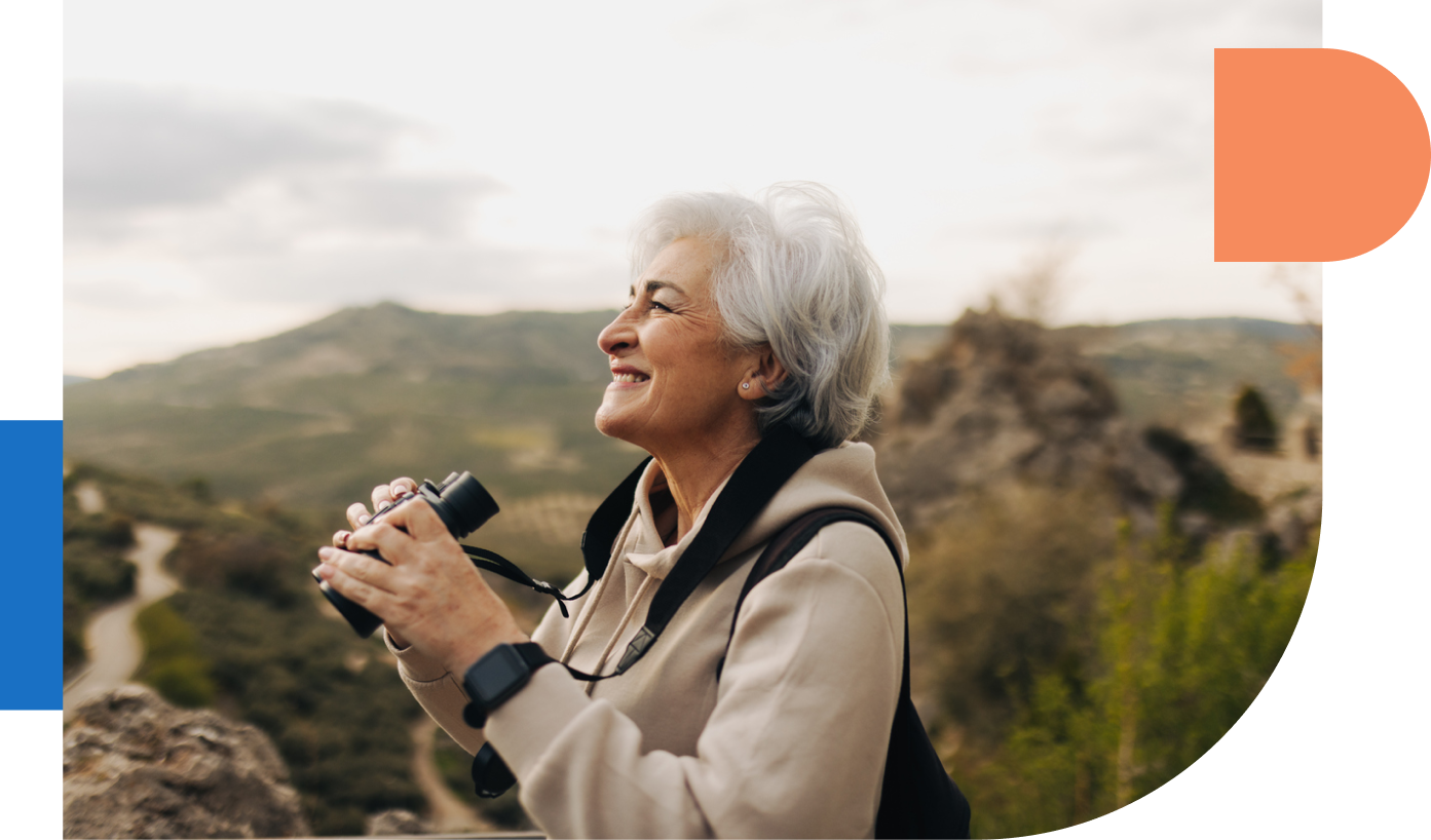 Senior woman using binoculars