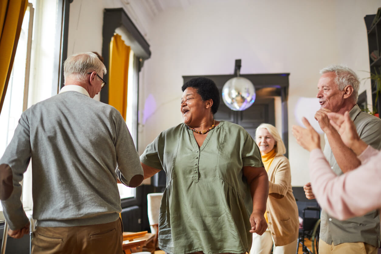 Adults enjoying each other's company in a get together