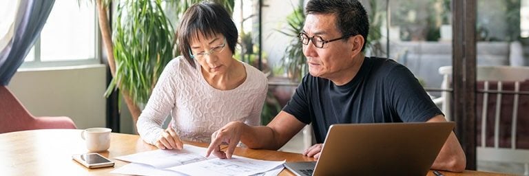 older couple searching for resources