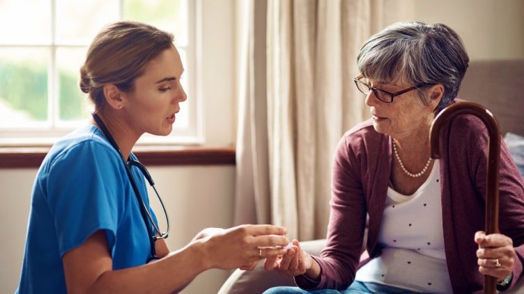 Older woman meeting with doctor