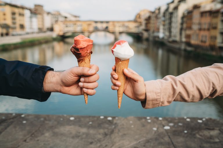 Couple eating gelato in Florence, Italy
