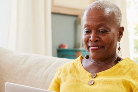 Elderly woman on her laptop