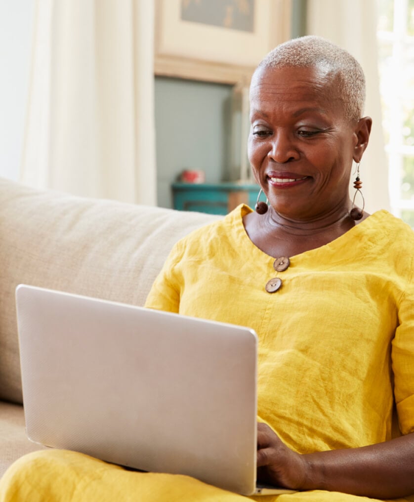 Elderly woman on her laptop