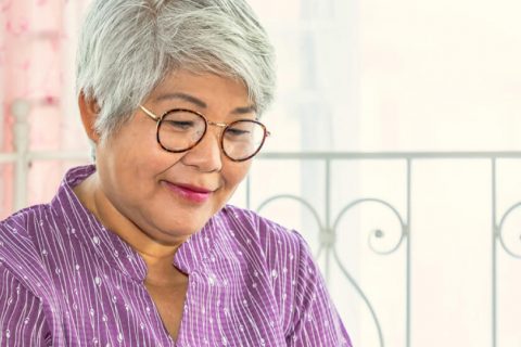 Woman signing up for Medicare on her iPad