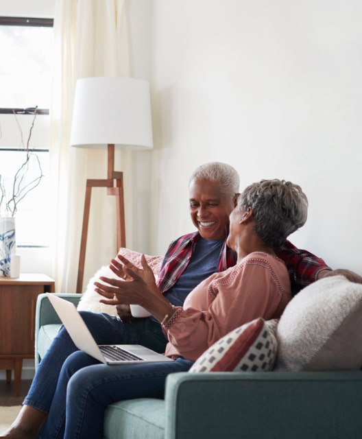 Older couple laughing together