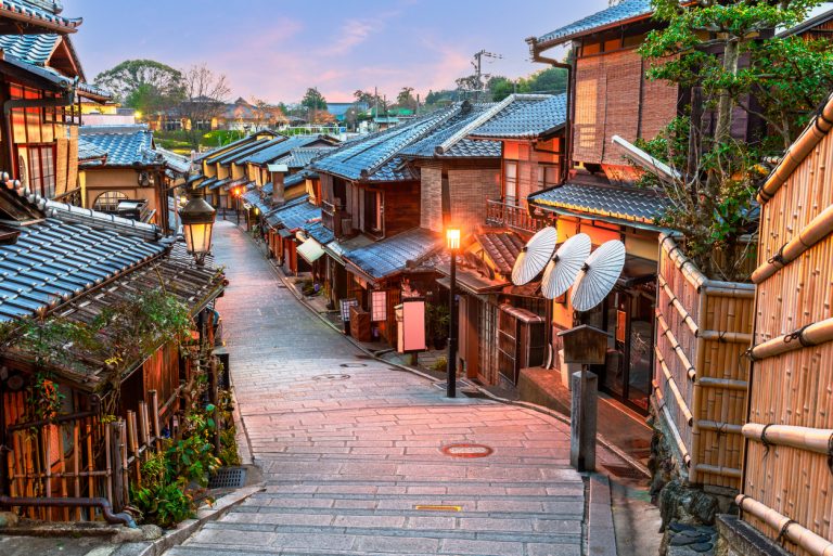 Gorgeous view of a winding path and traditional architecture in Kyoto, Japan at twilight