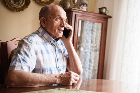 Elderly man on phone