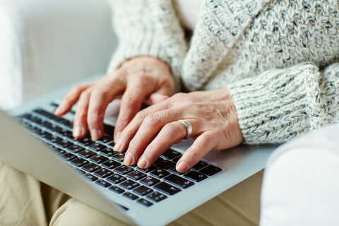 Elderly woman on laptop