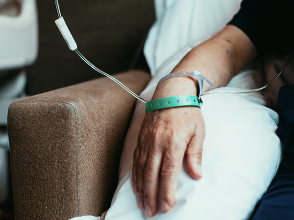 Man receiving infusion therapy