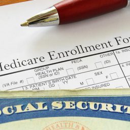 Medicare open enrollment form and social security card