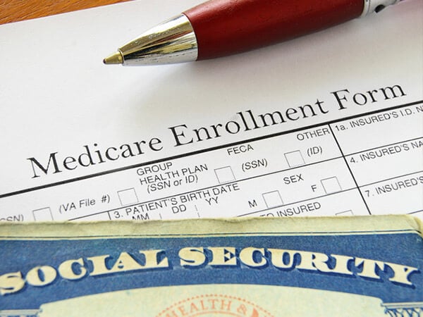 Medicare open enrollment form and social security card