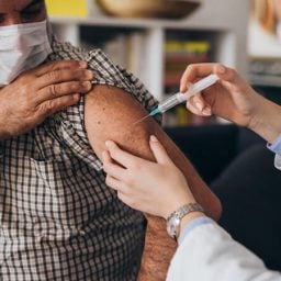 Older man receiving the Covid-19 vaccine