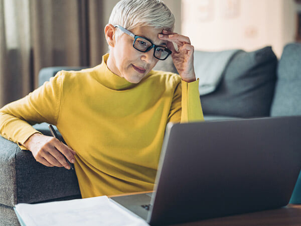 Older woman struggling to use a website