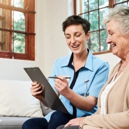 Young woman surveying older woman