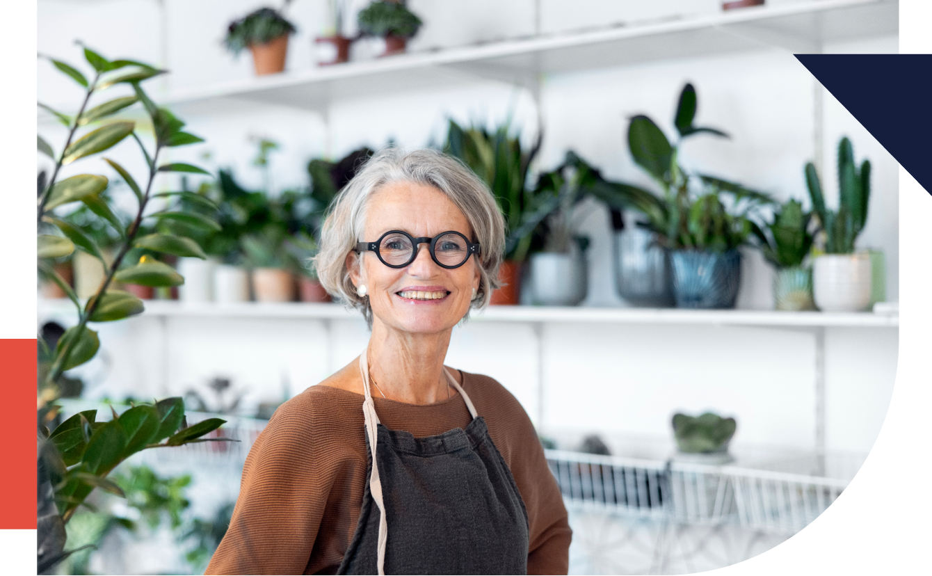 Portrait of senior female florist in her shop