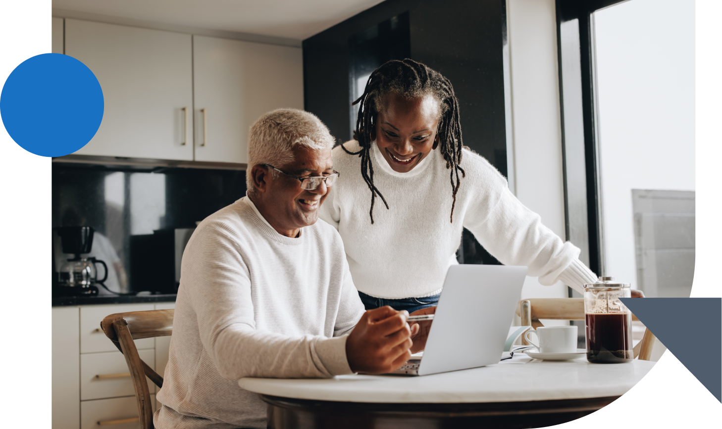 Couple retirement planning at home on laptop