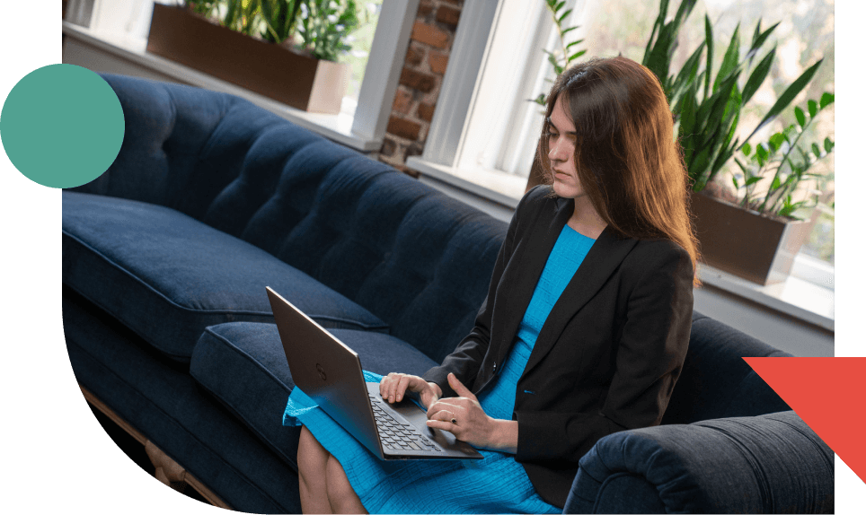 Businesswoman using her laptop