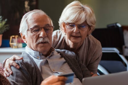 Senior couple online shopping