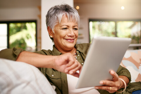 Senior using tablet